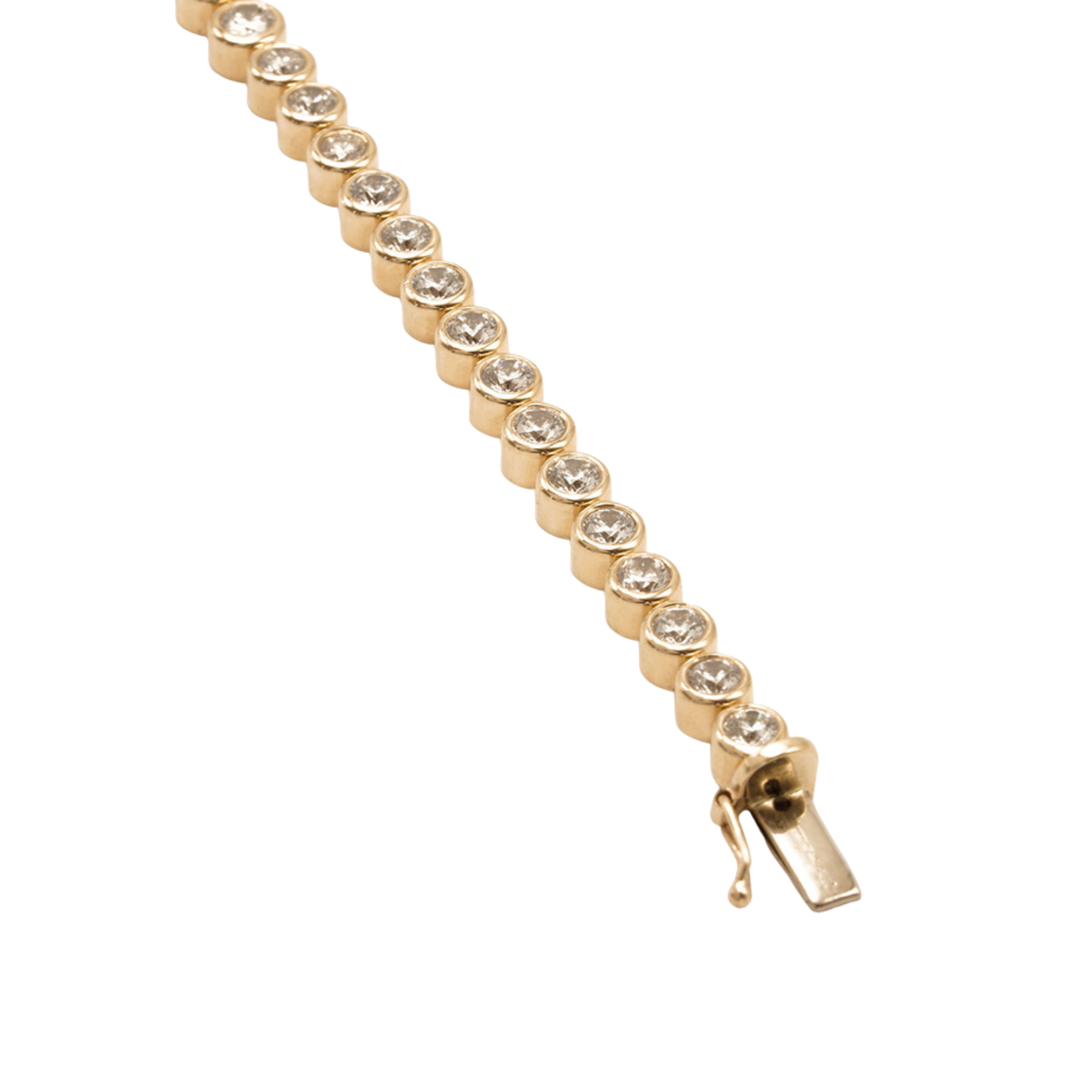 Tennis Bracelet In 18K Yellow Gold With Bezel Set Diamonds